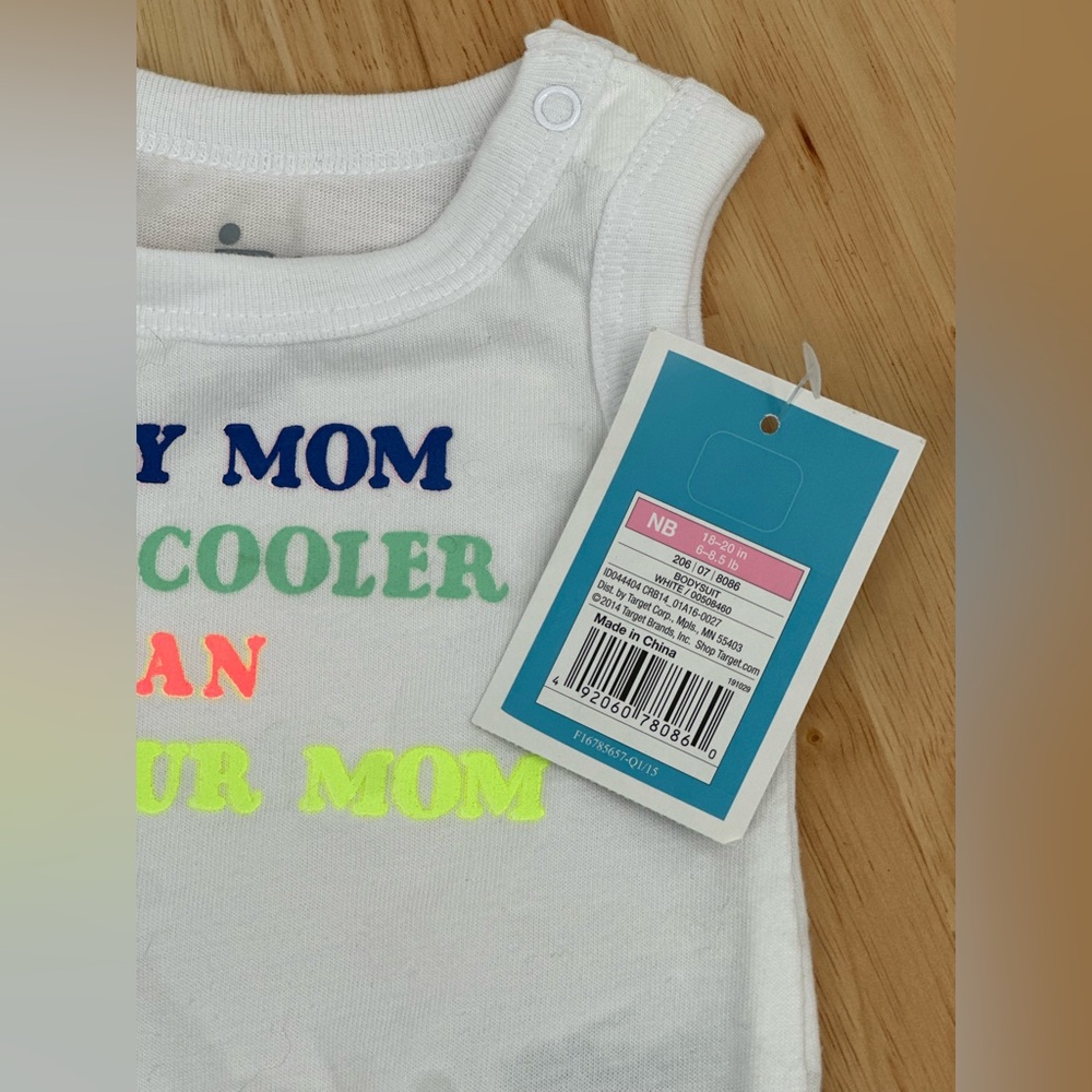 White Baby Onesie with Colorful “My Mom Is Cooler Than Your Mom” - Picture 3 of 3
